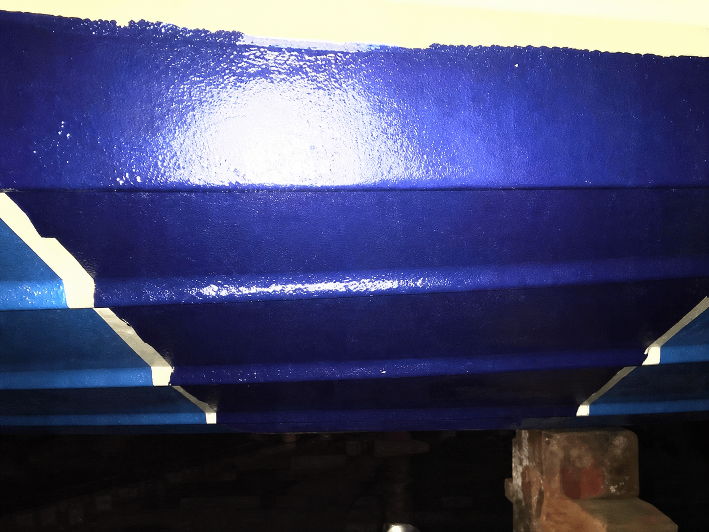 Dark-blue DelphySkin-treated coating after one year in the North Sea